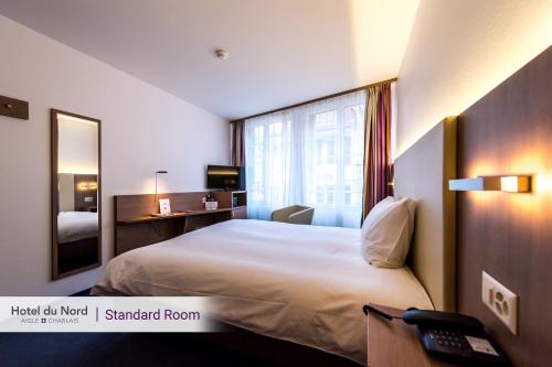 Imagen de la habitación del Hotel Du Nord Aigle. Foto 9