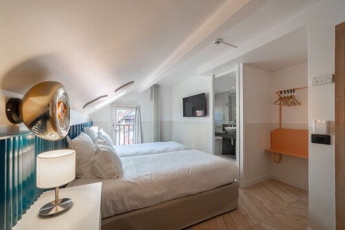 Imagen de la habitación del Hotel Du Palais De L'isle. Foto 16