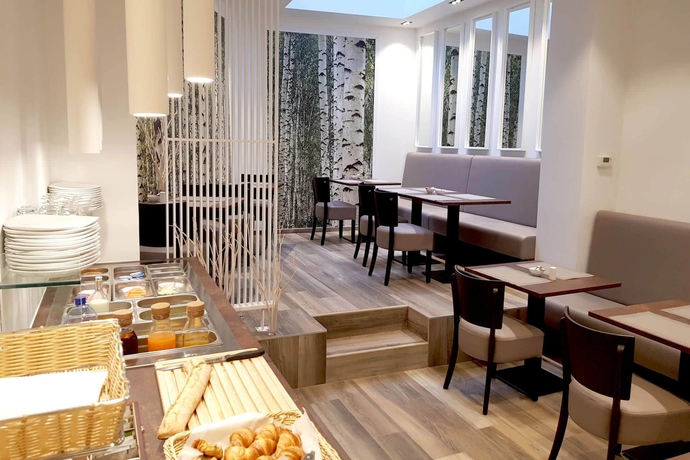Imagen del bar/restaurante del Hotel Du Parc, Ath. Foto 6