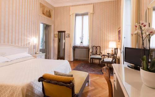Imagen de la habitación del Hotel Du Parc, Binda. Foto 7