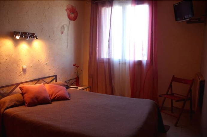 Imagen de la habitación del Hotel Du Patriarche. Foto 10