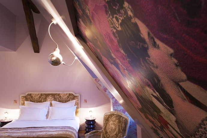 Imagen de la habitación del Hotel Du Petit Moulin. Foto 6