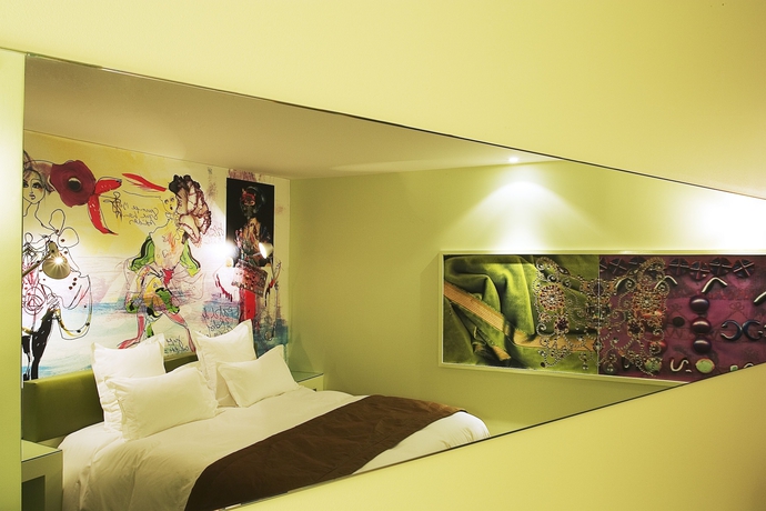 Imagen de la habitación del Hotel Du Petit Moulin. Foto 7