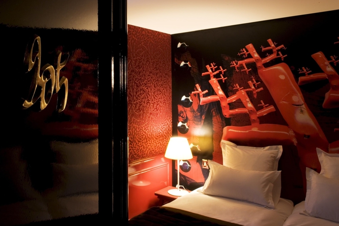 Imagen de la habitación del Hotel Du Petit Moulin. Foto 13