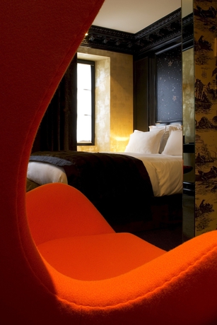 Imagen de la habitación del Hotel Du Petit Moulin. Foto 14