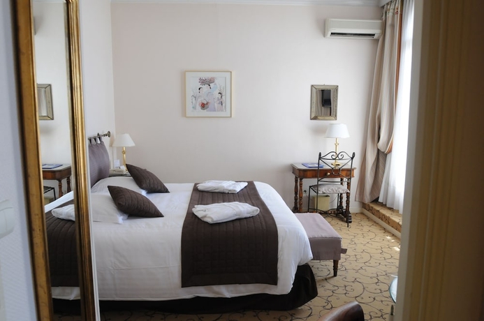 Imagen de la habitación del Hotel Du Petit Palais. Foto 2