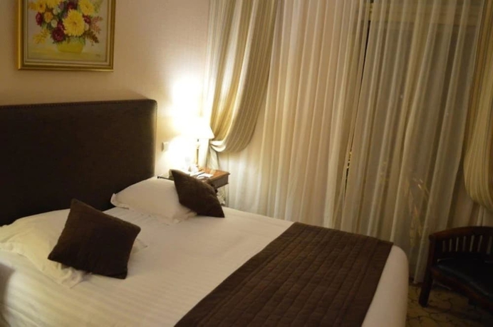 Imagen de la habitación del Hotel Du Petit Palais. Foto 5