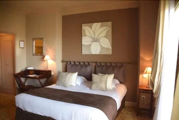 Imagen de la habitación del Hotel Du Petit Palais. Foto 6