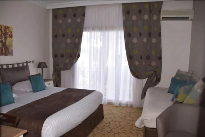 Imagen de la habitación del Hotel Du Petit Palais. Foto 7