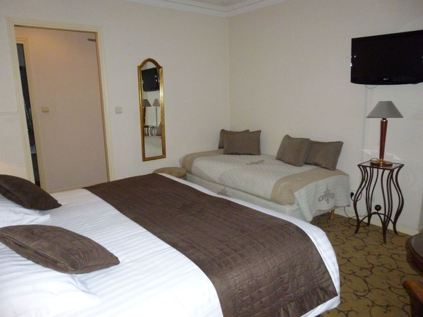Imagen de la habitación del Hotel Du Petit Palais. Foto 9