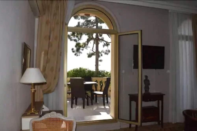 Imagen de la habitación del Hotel Du Petit Palais. Foto 16