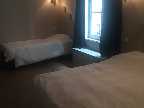 Imagen de la habitación del Hotel Du Pot D'etain. Foto 7
