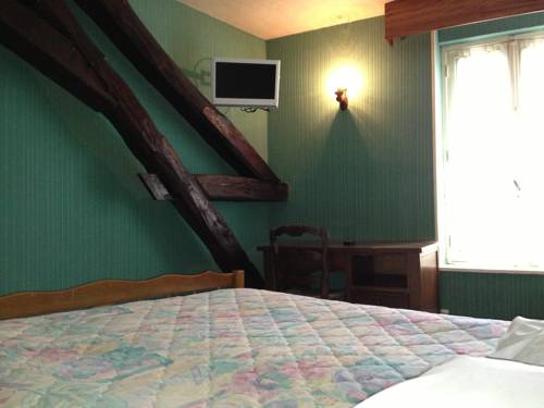 Imagen de la habitación del Hotel Du Rempart. Foto 13