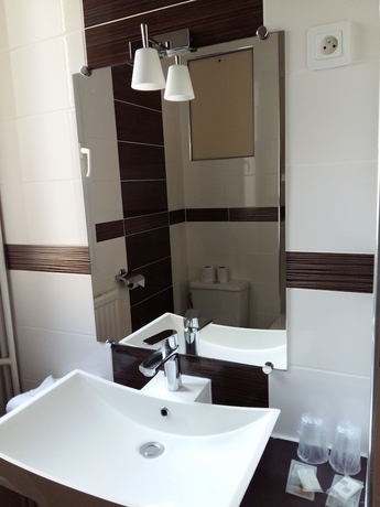 Imagen de la habitación del Hotel Du Roi René. Foto 14