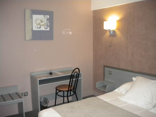 Imagen de la habitación del Hotel Du Soleil Levant. Foto 9