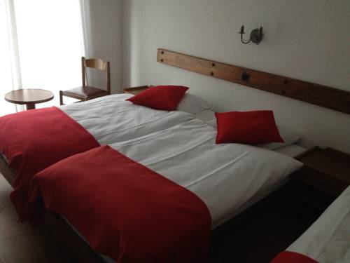 Imagen de la habitación del Hotel Du Stand. Foto 3