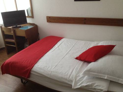 Imagen de la habitación del Hotel Du Stand. Foto 10