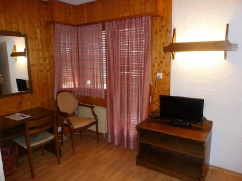 Imagen de la habitación del Hotel Du Stand. Foto 13
