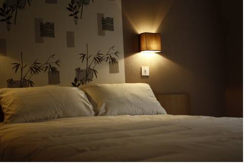 Imagen de la habitación del Hotel Du Touring. Foto 2