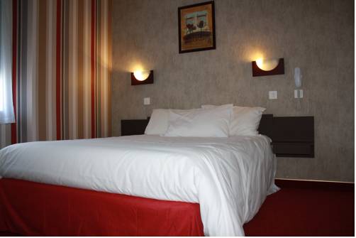 Imagen de la habitación del Hotel Du Touring. Foto 4