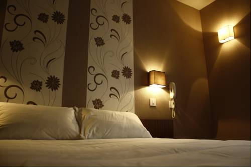 Imagen de la habitación del Hotel Du Touring. Foto 7