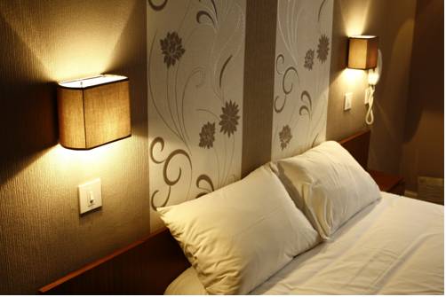 Imagen de la habitación del Hotel Du Touring. Foto 8