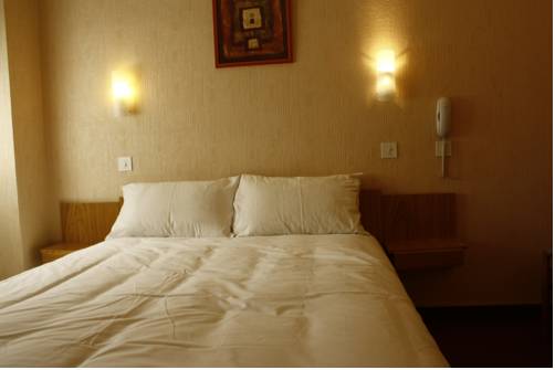 Imagen de la habitación del Hotel Du Touring. Foto 9