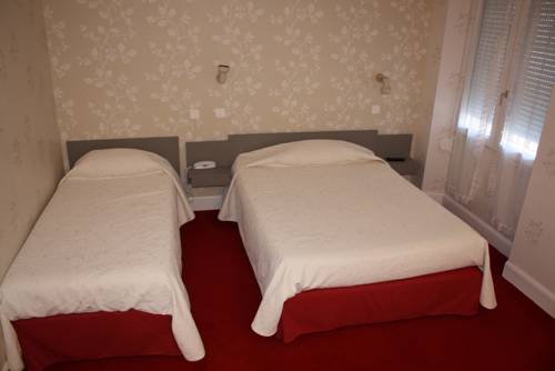 Imagen de la habitación del Hotel Du Touring. Foto 10