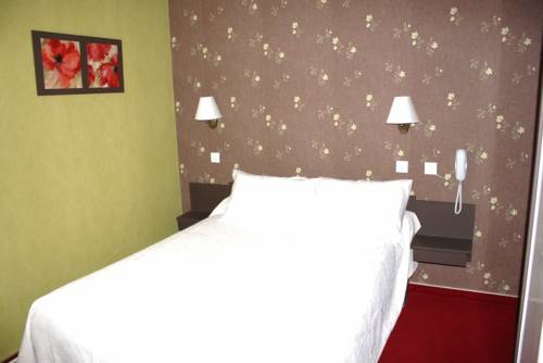 Imagen de la habitación del Hotel Du Touring. Foto 12