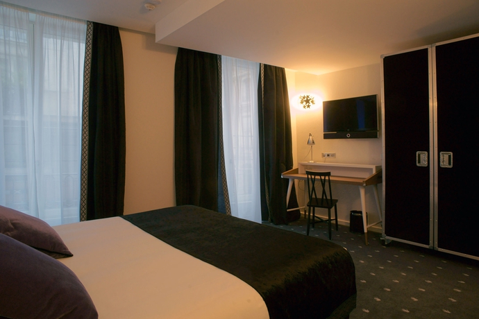 Imagen de la habitación del Hotel Du Triangle D'or. Foto 3