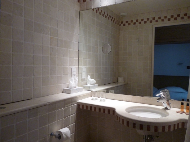 Imagen de la habitación del Hotel Du Vieux Marais. Foto 5