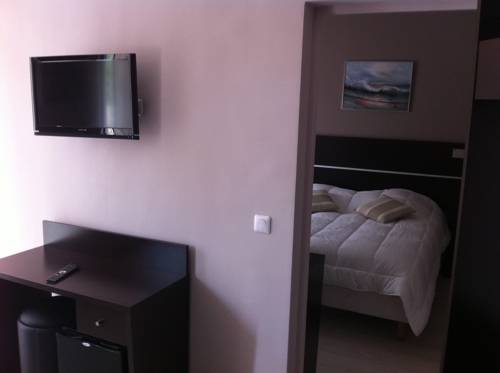 Imagen de la habitación del Hotel Du Vieux Port. Foto 7