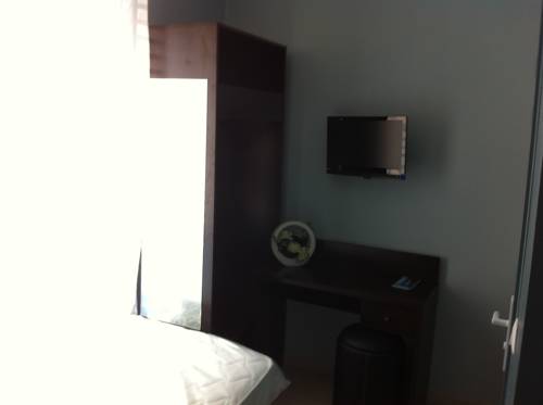 Imagen de la habitación del Hotel Du Vieux Port. Foto 13