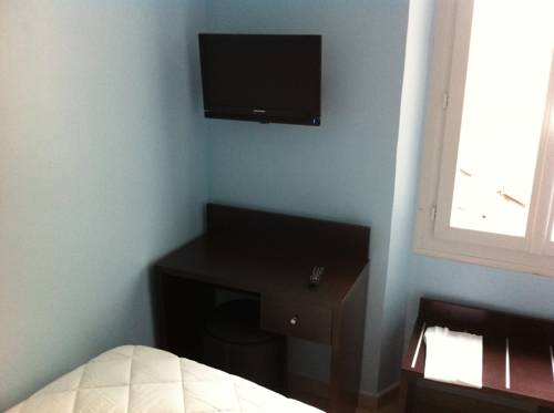 Imagen de la habitación del Hotel Du Vieux Port. Foto 15