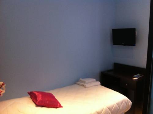 Imagen de la habitación del Hotel Du Vieux Port. Foto 16