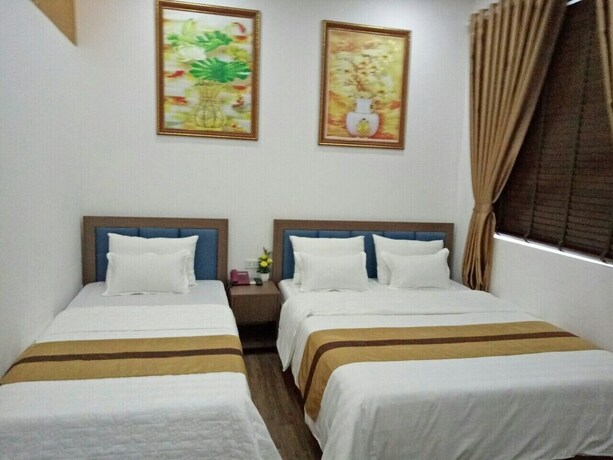 Imagen de la habitación del Hotel Duc Long, Hanoi. Foto 32