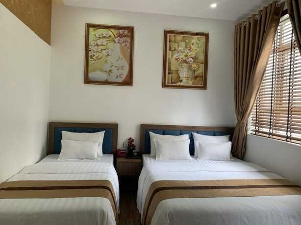 Imagen de la habitación del Hotel Duc Long, Hanoi. Foto 33