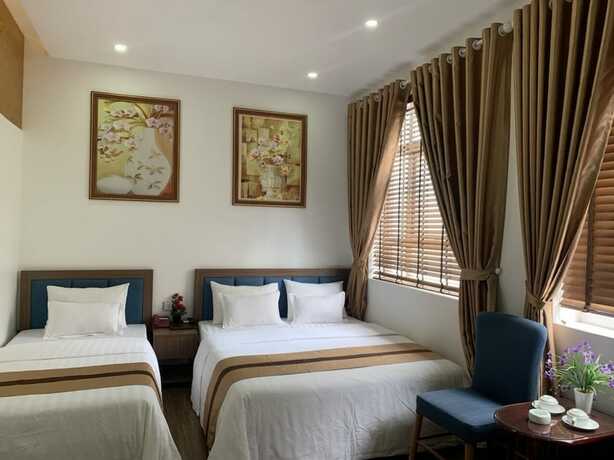 Imagen de la habitación del Hotel Duc Long, Hanoi. Foto 37