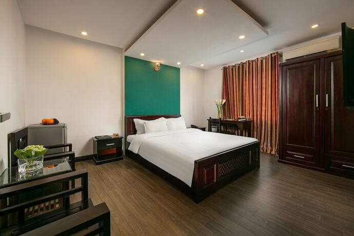Imagen de la habitación del Hotel Duc Trong. Foto 18