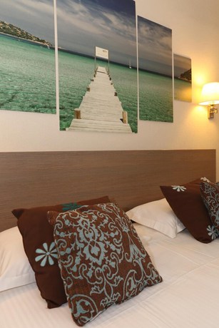 Imagen de la habitación del Hotel Duc de Padoue. Foto 17