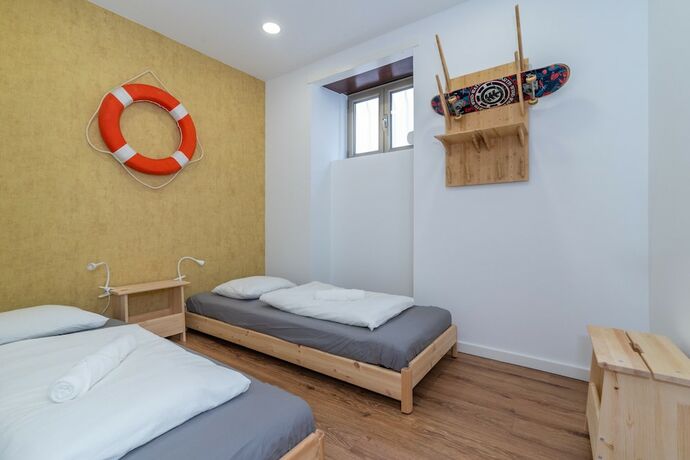 Imagen de la habitación del Hotel Dude Beach Hostel. Foto 17