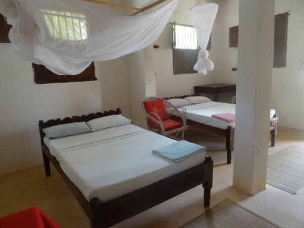 Imagen de la habitación del Hotel Dudu Villas N Backpackers. Foto 4