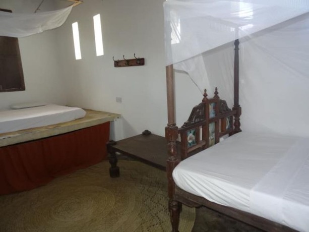 Imagen de la habitación del Hotel Dudu Villas N Backpackers. Foto 9