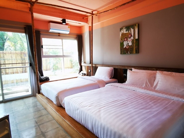 Imagen de la habitación del Hotel Dugong Village-green. Foto 8