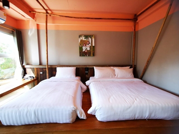 Imagen de la habitación del Hotel Dugong Village-green. Foto 9