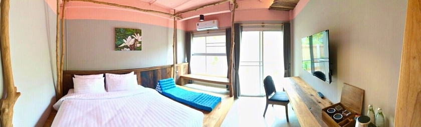 Imagen de la habitación del Hotel Dugong Village-green. Foto 11