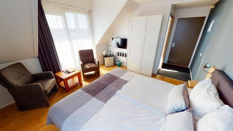 Imagen de la habitación del Hotel DuinTexel. Foto 8