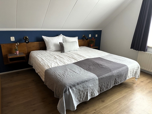 Imagen de la habitación del Hotel DuinTexel. Foto 11