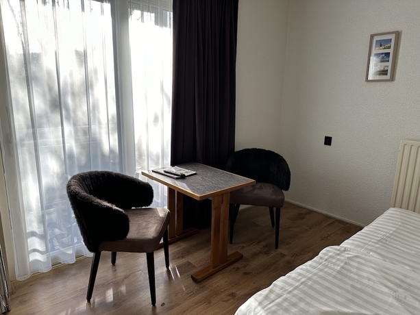 Imagen de la habitación del Hotel DuinTexel. Foto 13