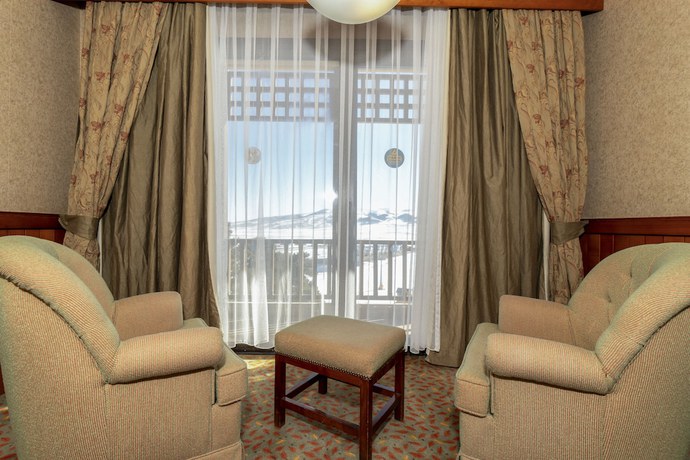 Imagen de la habitación del Hotel Duja Chalet Ski Center. Foto 10